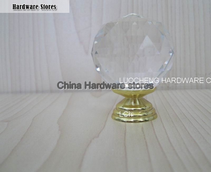 50PCS / LOT 40MM CLEAR CUT CRYSTAL KNOBS ON SMALL GOLD BRASS BASE 50PCS / LOT 40MM CLEAR CUT CRYSTAL KNOBS ON SMALL GOLD BRASS BASE