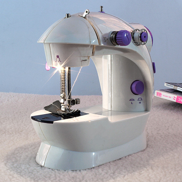 2015 new portable home handwork electric mini sewing machine with led light 2015 new portable home handwork electric mini sewing machine with led light