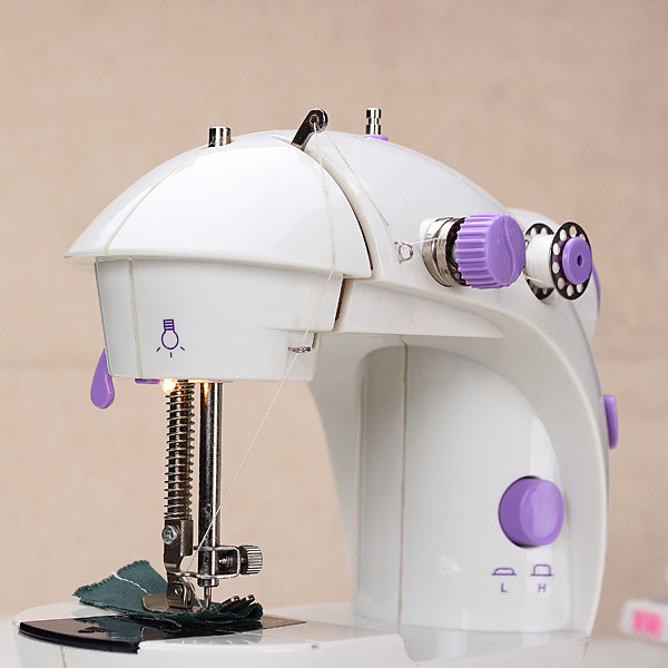 2015 new portable home handwork electric mini sewing machine with led light